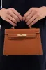 Tan Hariette Handle Bag sold by Tuckernuck