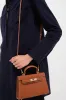 Tan Hariette Handle Bag sold by Tuckernuck