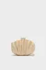 Sand The Origami Shell Clutch sold by Tuckernuck