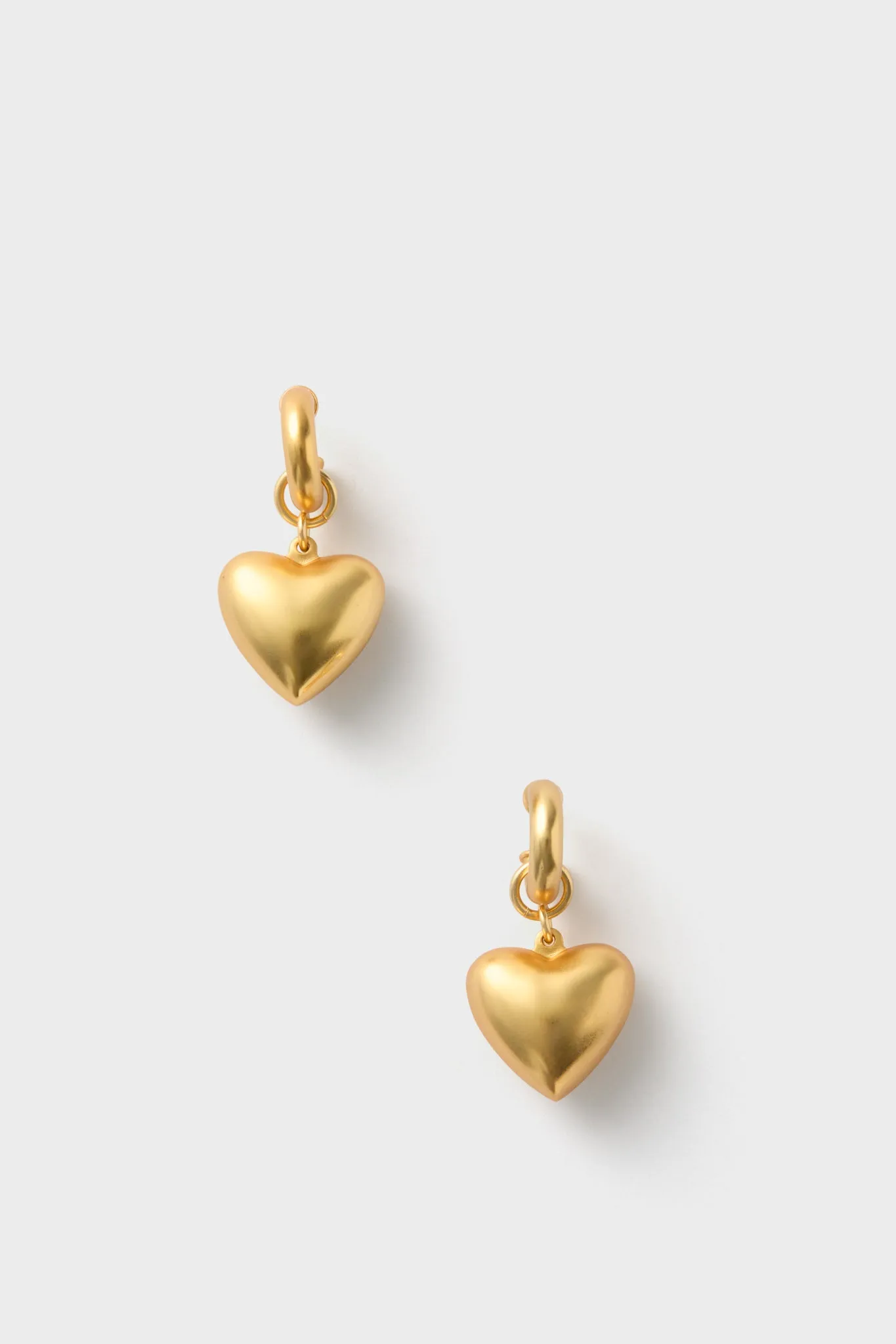 Gold Puffy Heart Earrings sold by Tuckernuck