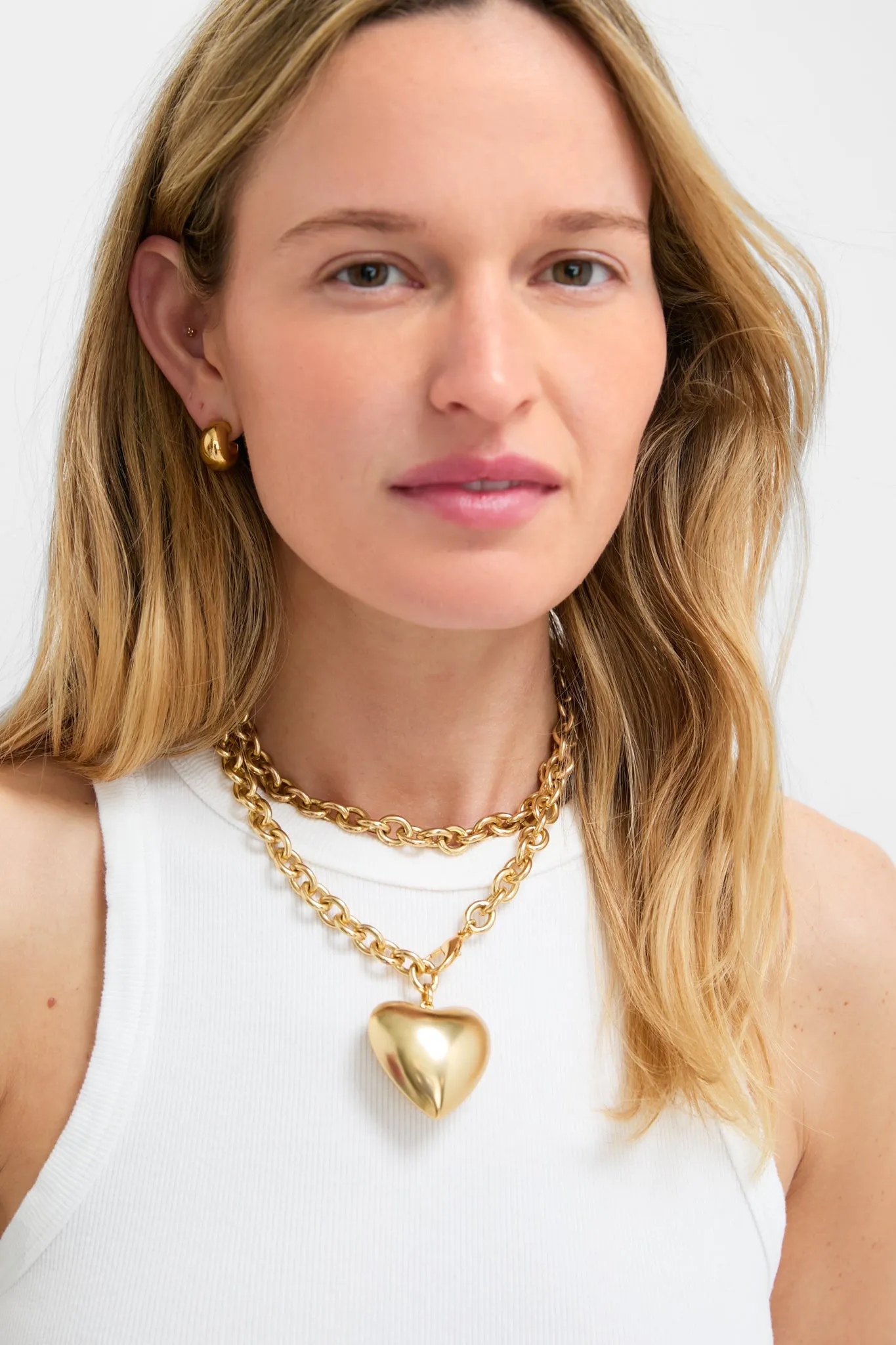 Gold Puffy Heart Necklace sold by Tuckernuck product image thumbnail 3