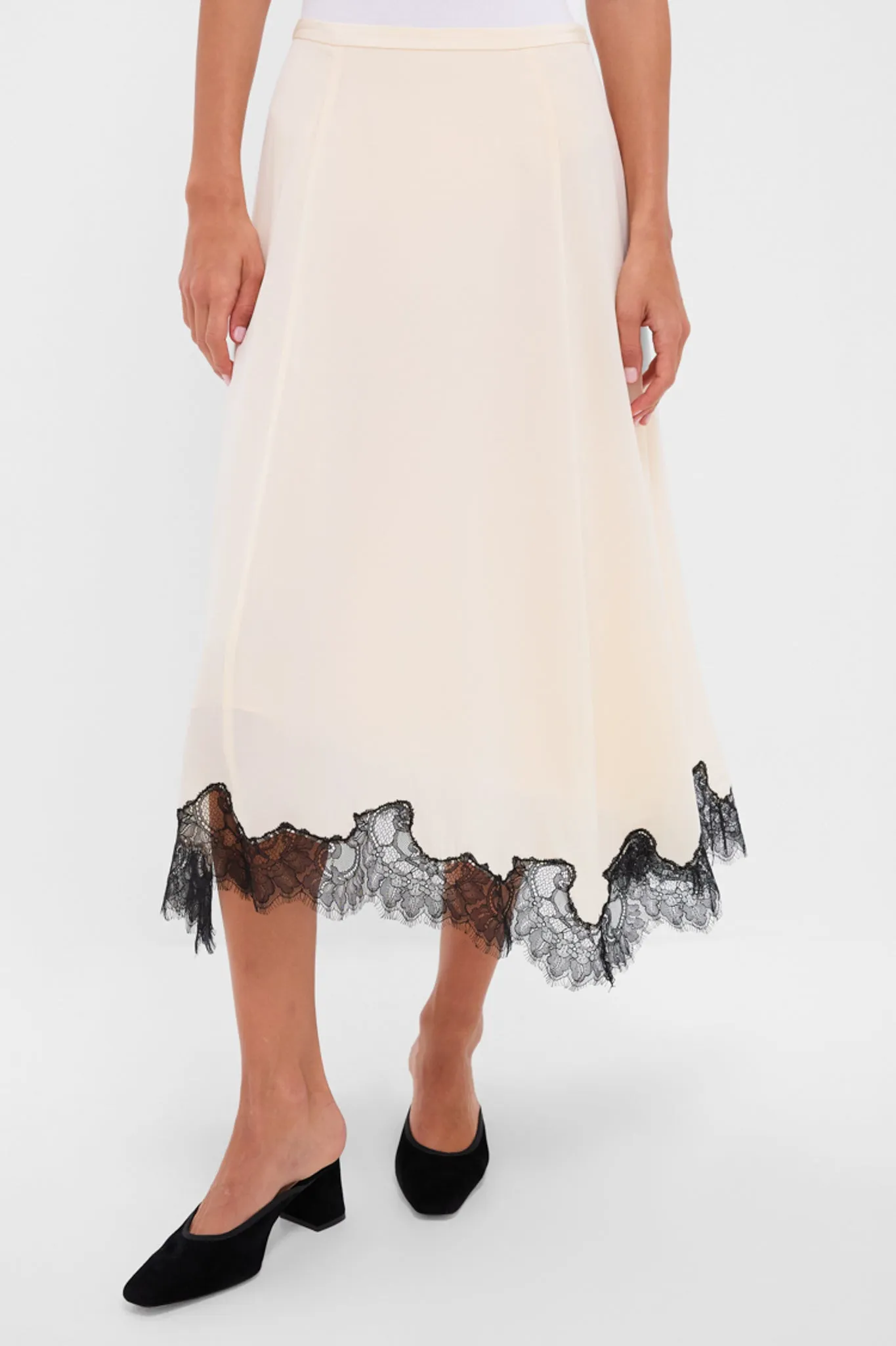 Creme Rosine High Waisted Asymmetrical Skirt sold by Tuckernuck