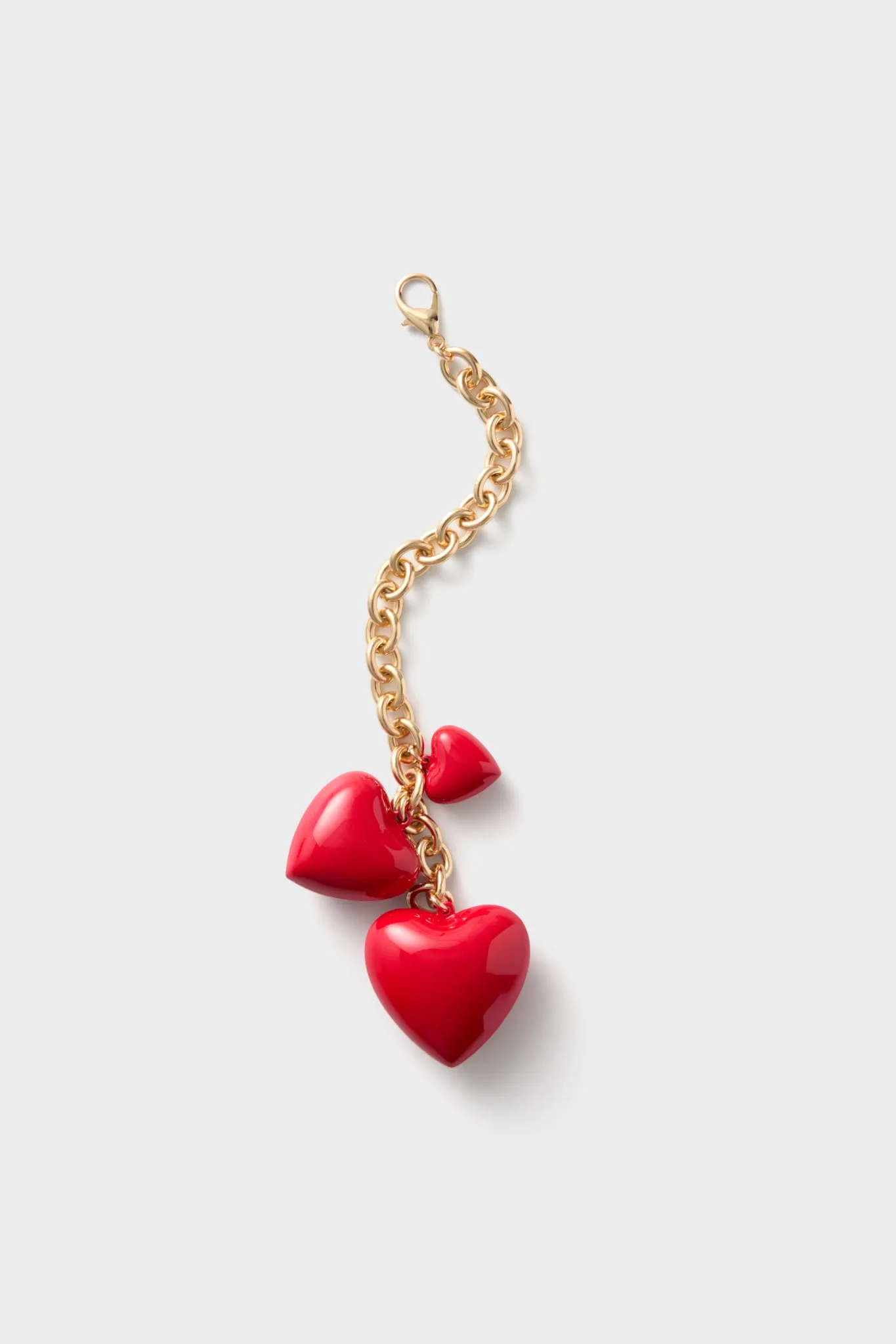 Gold and Cherry Red Happy Heart Bag Charm sold by Tuckernuck