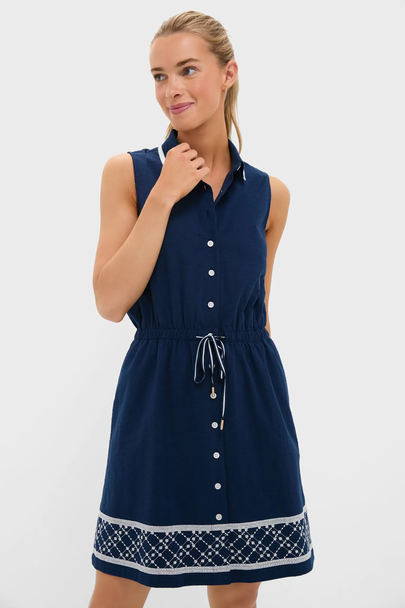 Navy and White Embroidered Seersucker Sleeveless Alcott Golf Dress sold by Tuckernuck
