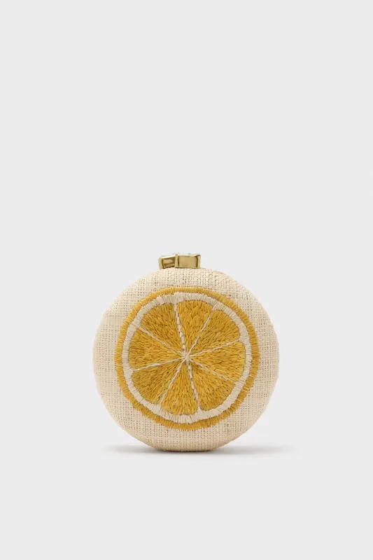 Natural and Yellow Lemon Slice Minaudiere sold by Tuckernuck