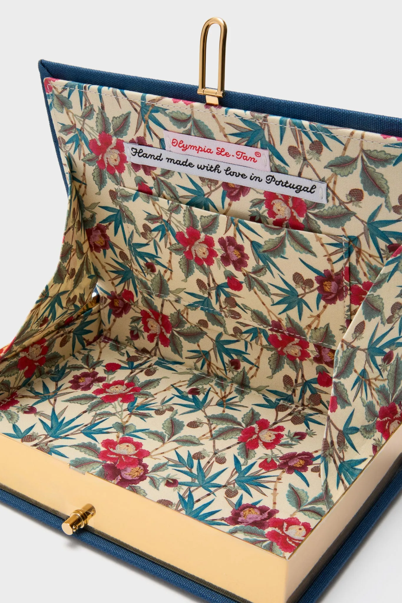 Indigo Latim Manhattan Cocktail Book Clutch sold by Tuckernuck product image thumbnail 5