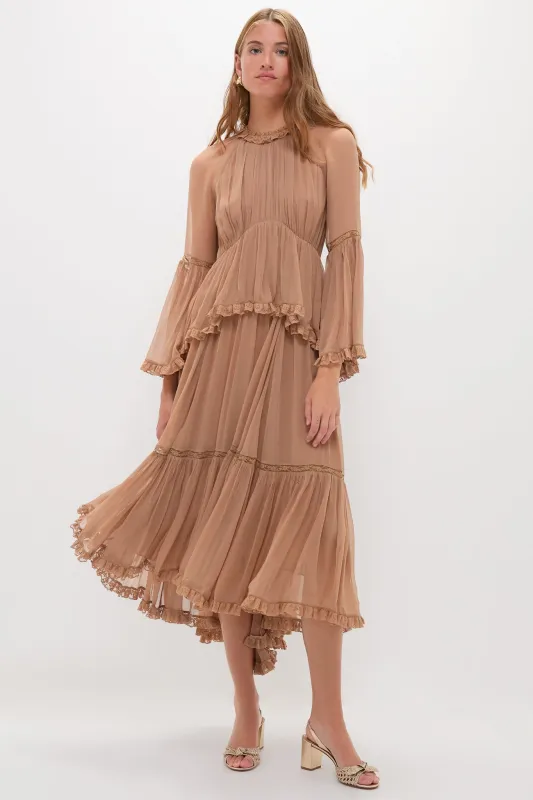 Biscuit Hypnotic Peplum Flutter Dress sold by Tuckernuck