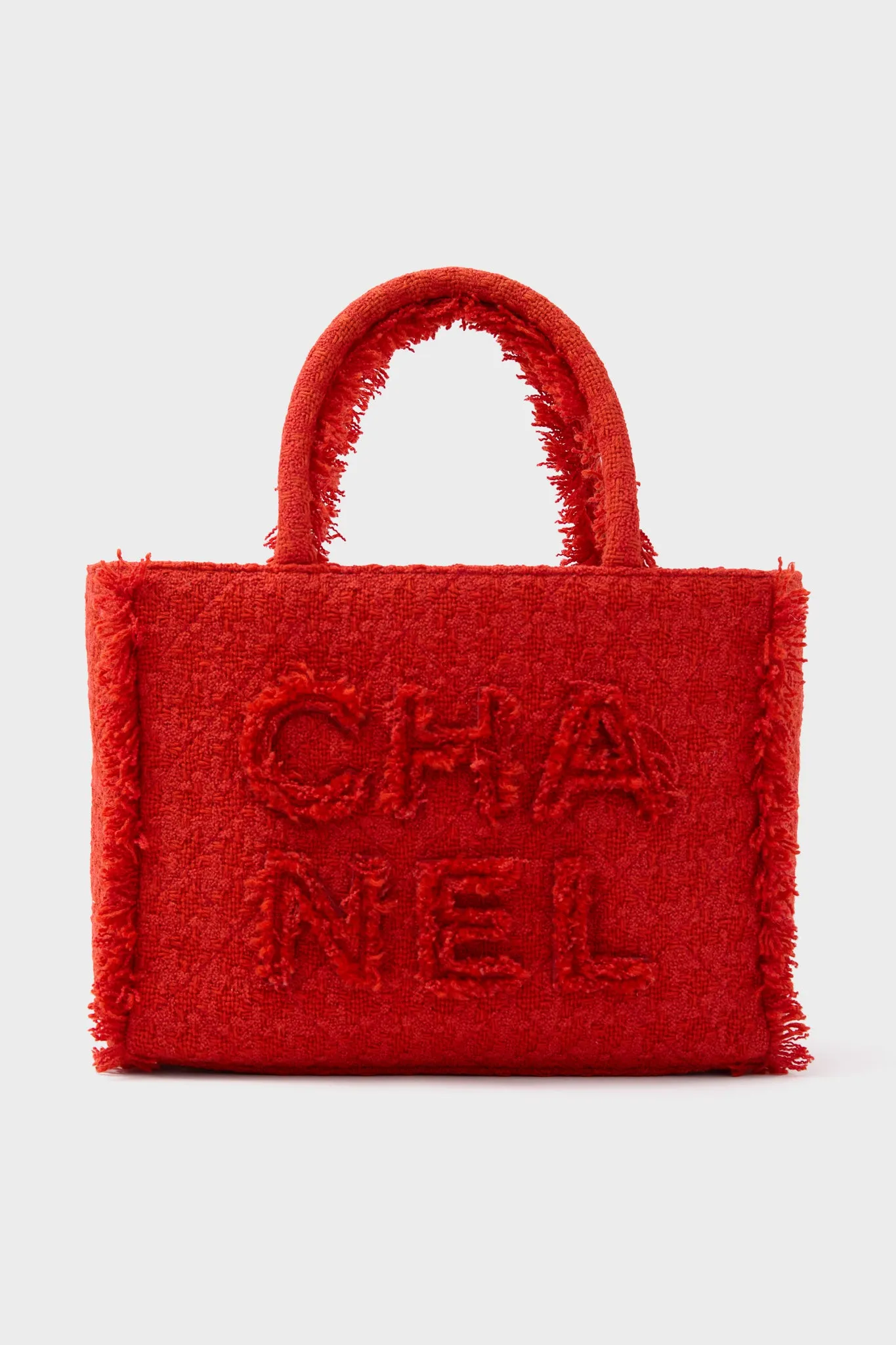 CHANEL Red Zipped Shopper Tote sold by Tuckernuck