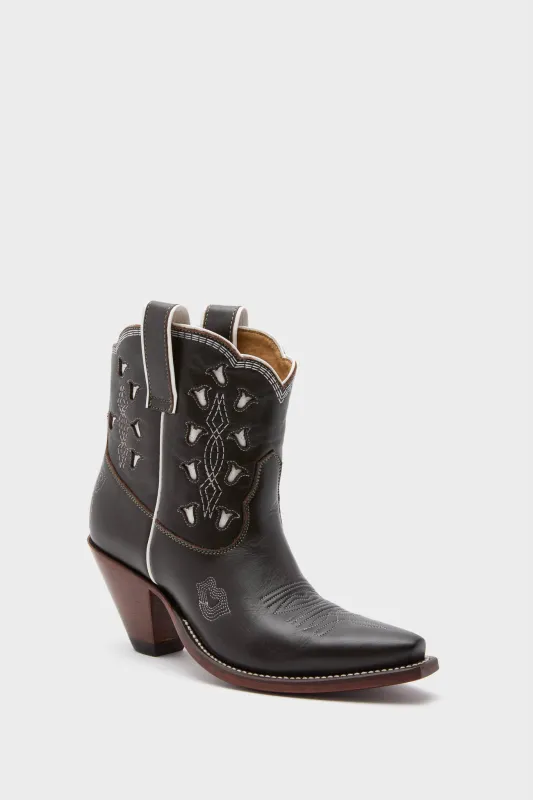 Chocolate and White Low Bright Boots sold by Tuckernuck