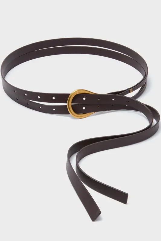 Chocolate and Gold Loop Belt sold by Tuckernuck