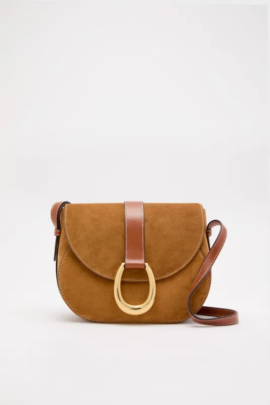 Tan Bella Saddle Bag sold by Tuckernuck