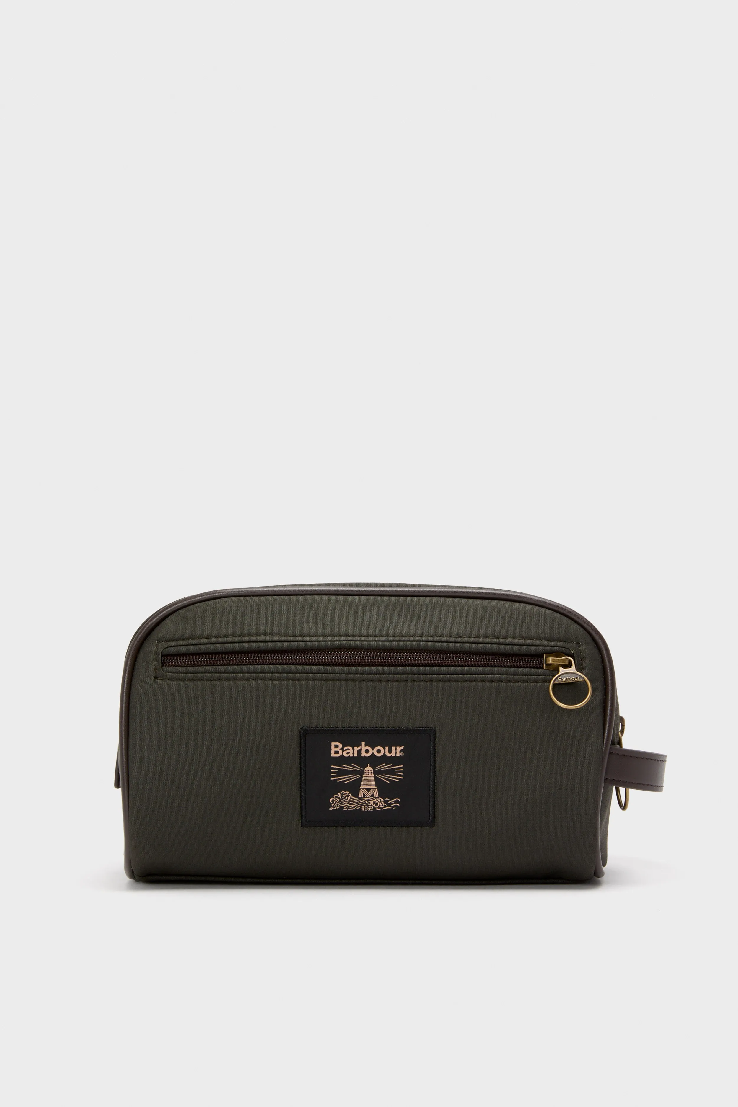 Olive Wax Washbag sold by Tuckernuck