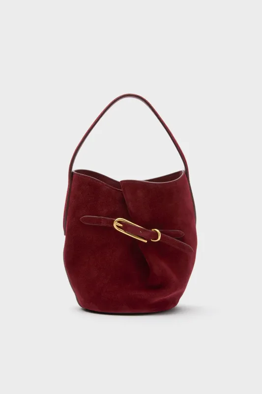 Maroon Suede Mini Belted Bucket Bag sold by Tuckernuck