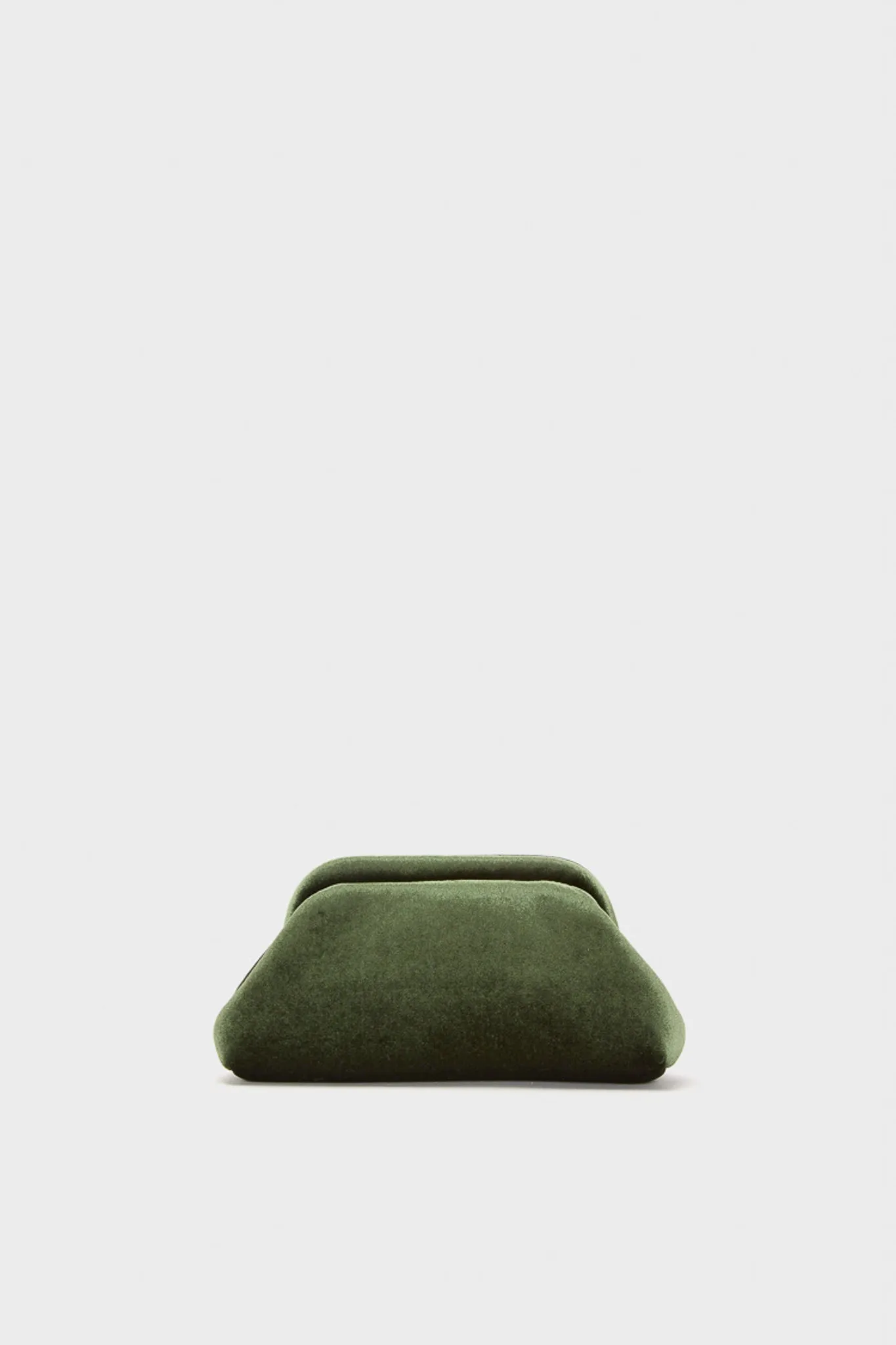 Green Velvet Clutch sold by Tuckernuck