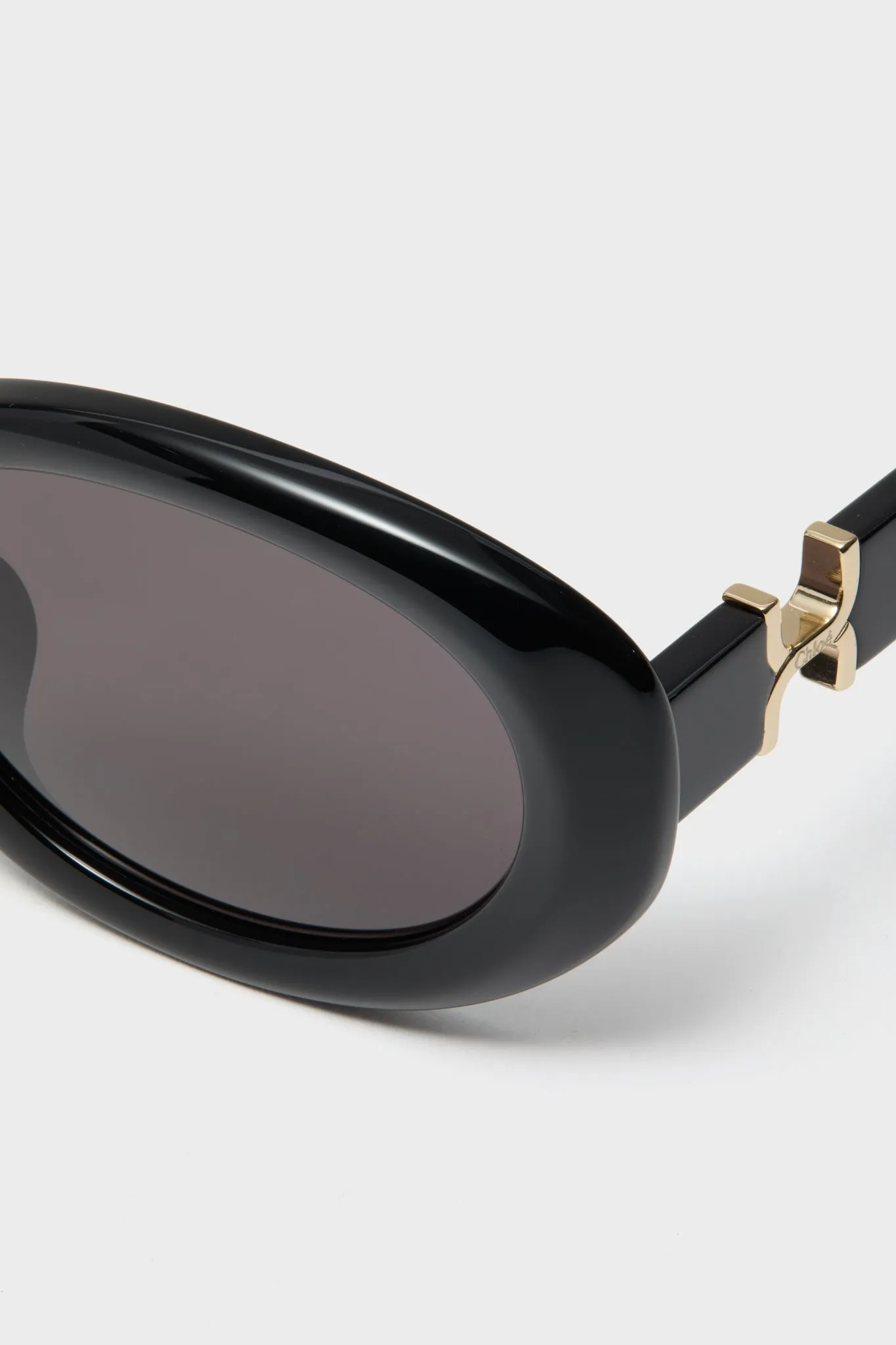Shiny Solid Black Marcie Sunglasses sold by Tuckernuck product image thumbnail 5