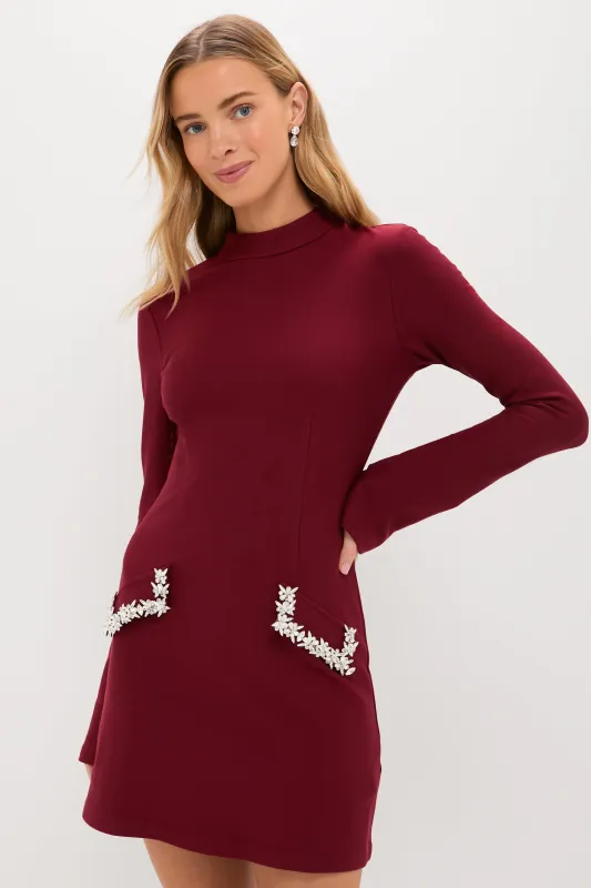 Oxblood Embellished Long Sleeve Bronwyn Mini Dress sold by Tuckernuck