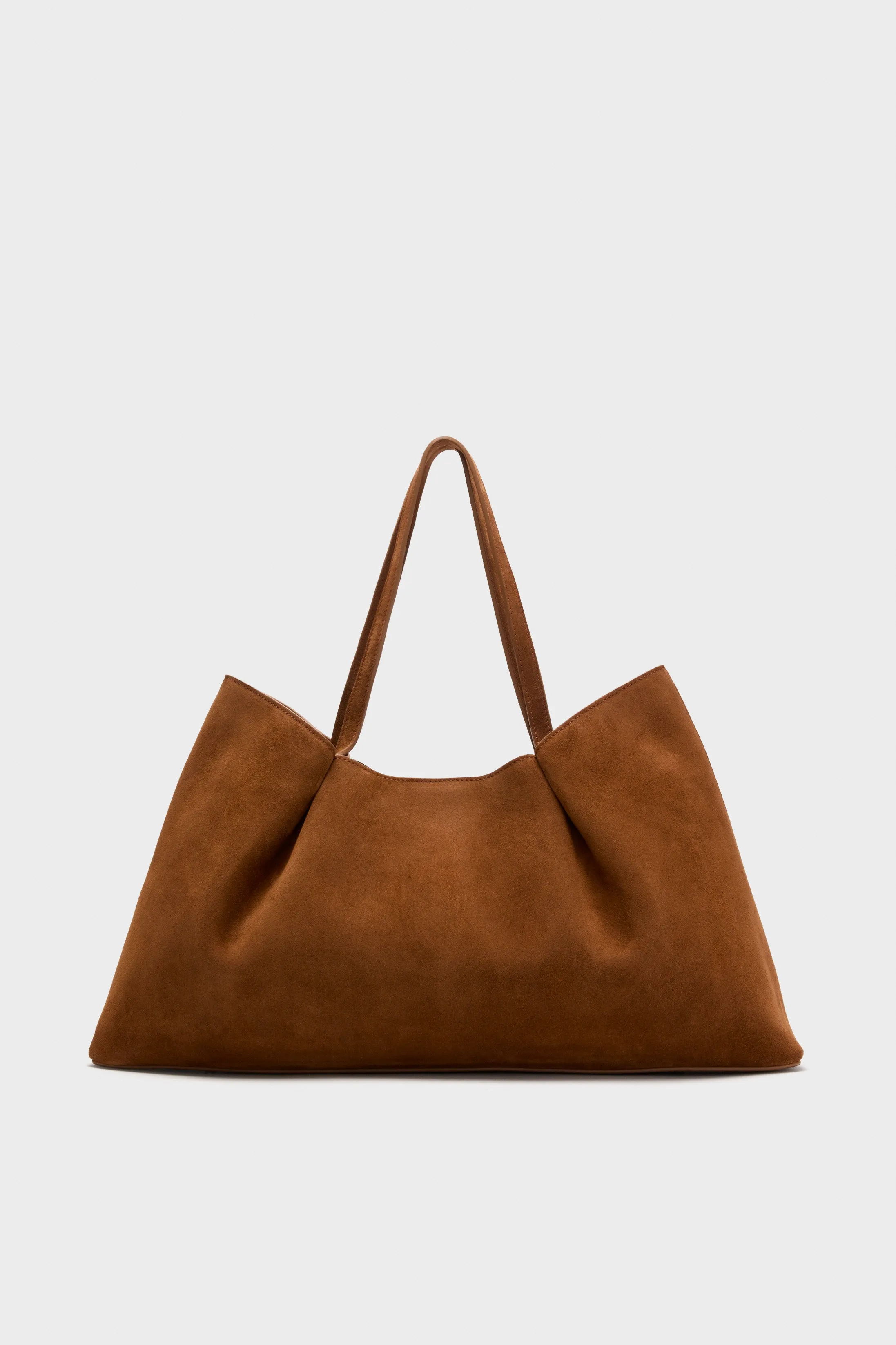 Cognac Suede Dimple Tote sold by Tuckernuck