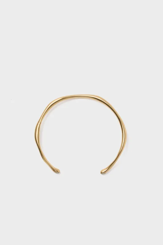 Gold Molten Snow Torque Statement Necklace sold by Tuckernuck