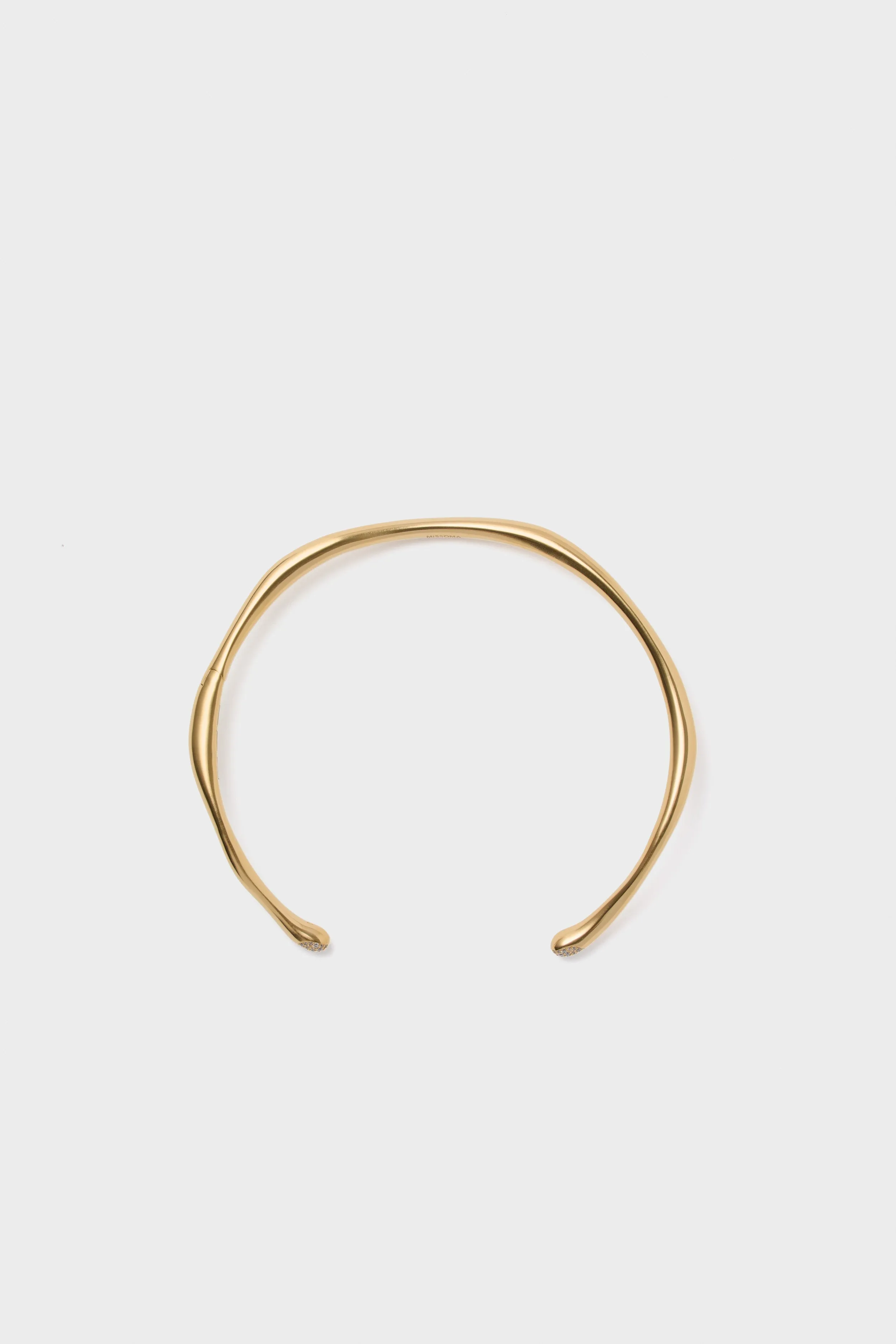 Gold Molten Snow Torque Statement Necklace sold by Tuckernuck