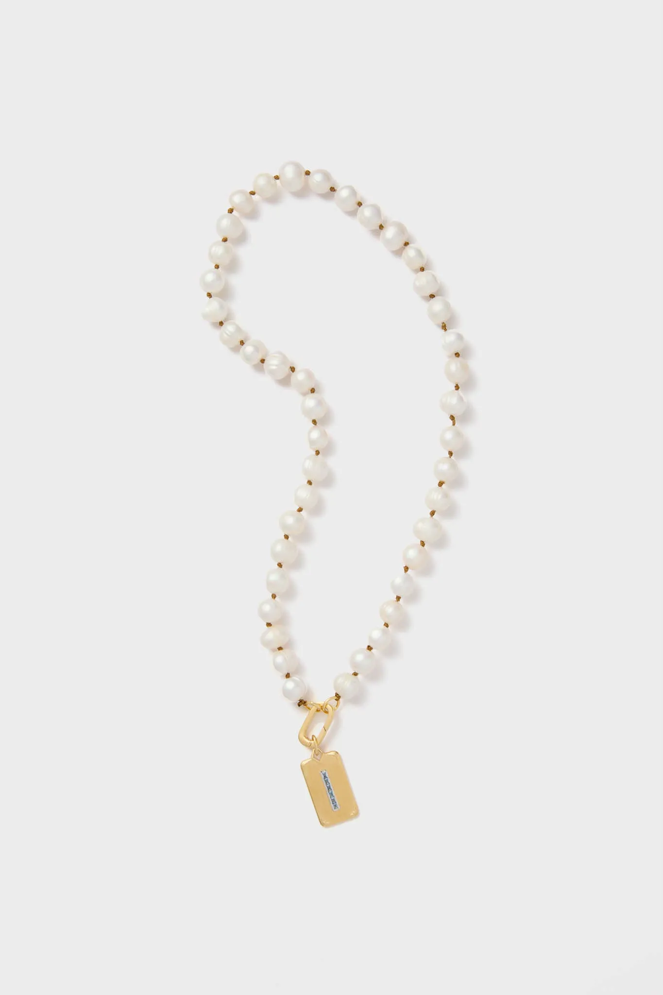 Pearl Necklace with Carpe Diem Charm sold by Tuckernuck