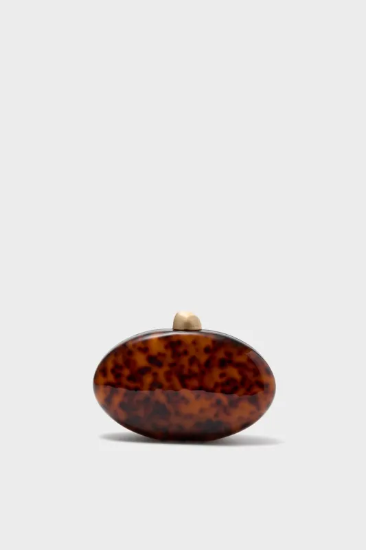 Caramel Tortoise Eviana Clutch sold by Tuckernuck