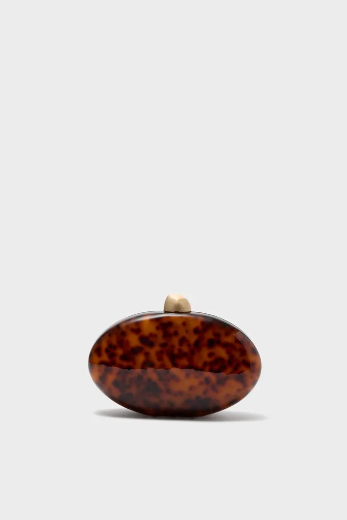 Caramel Tortoise Eviana Clutch sold by Tuckernuck