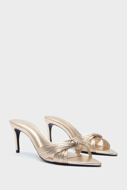 Platina Renee Mules sold by Tuckernuck