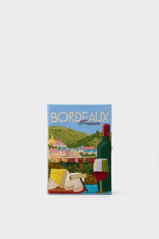 Hortensia Bordeaux Book Clutch sold by Tuckernuck