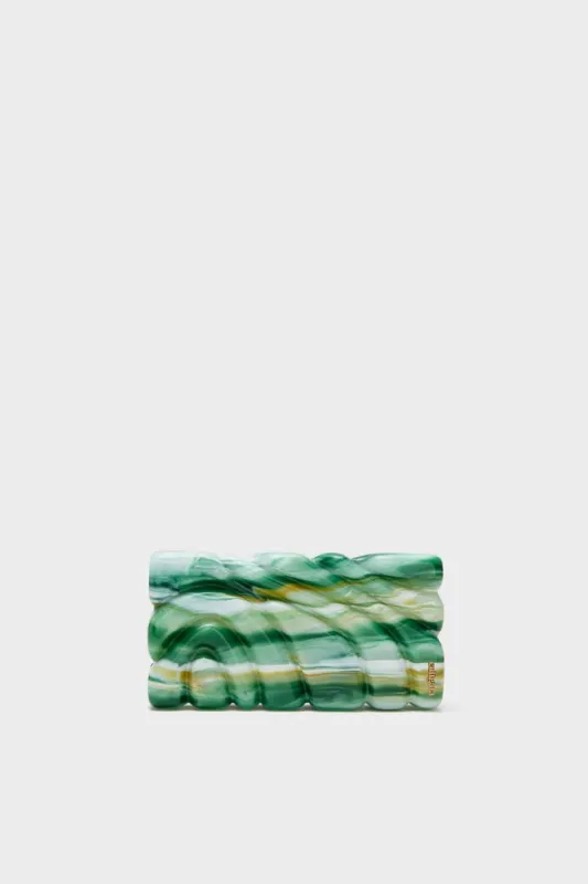 Sage Aura Clutch sold by Tuckernuck