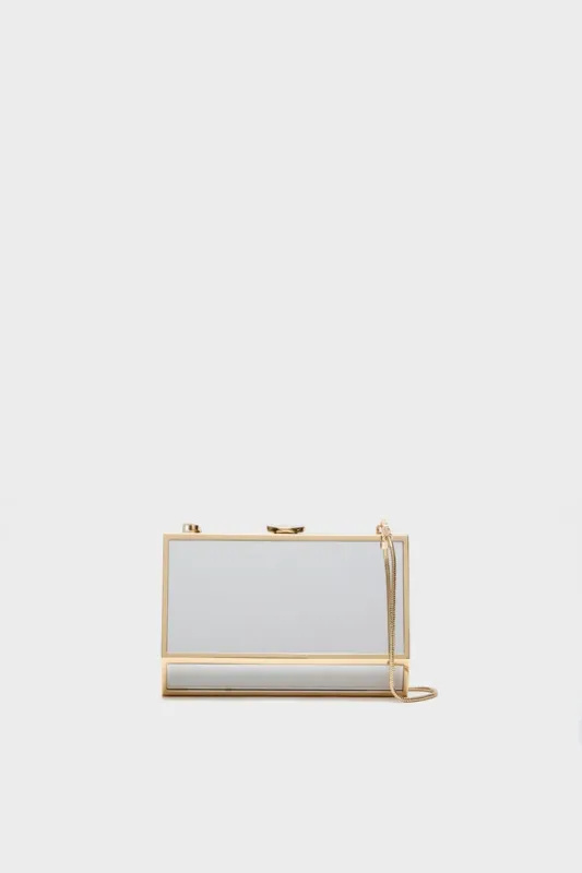 Gold Maddox Mirror Clutch sold by Tuckernuck