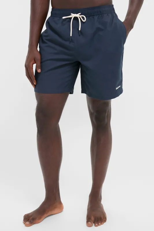 Navy Staple Logo 7 Inch Swim Shorts sold by Tuckernuck