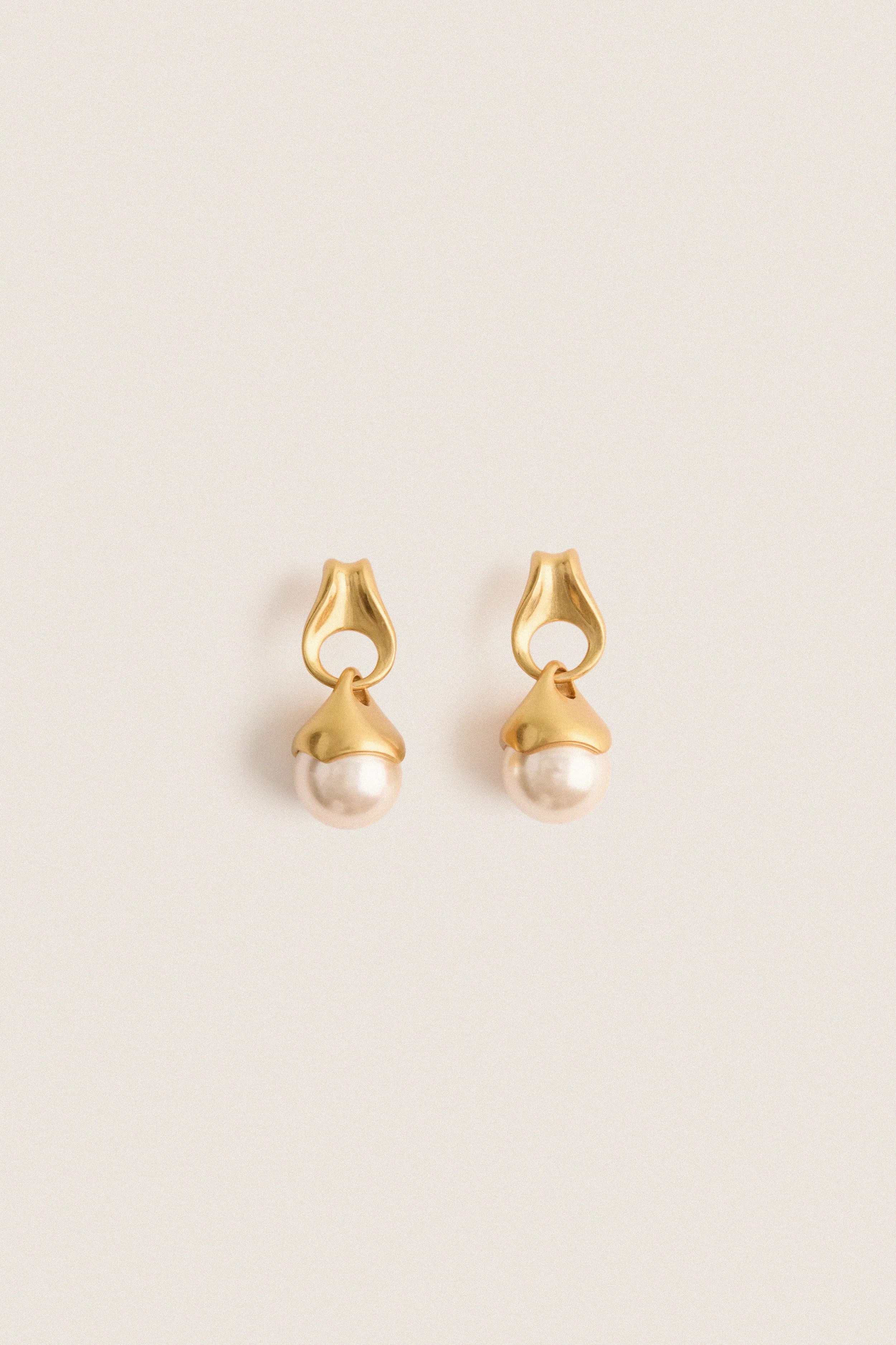 Gold and Pearl Drop Aline Earrings sold by Tuckernuck
