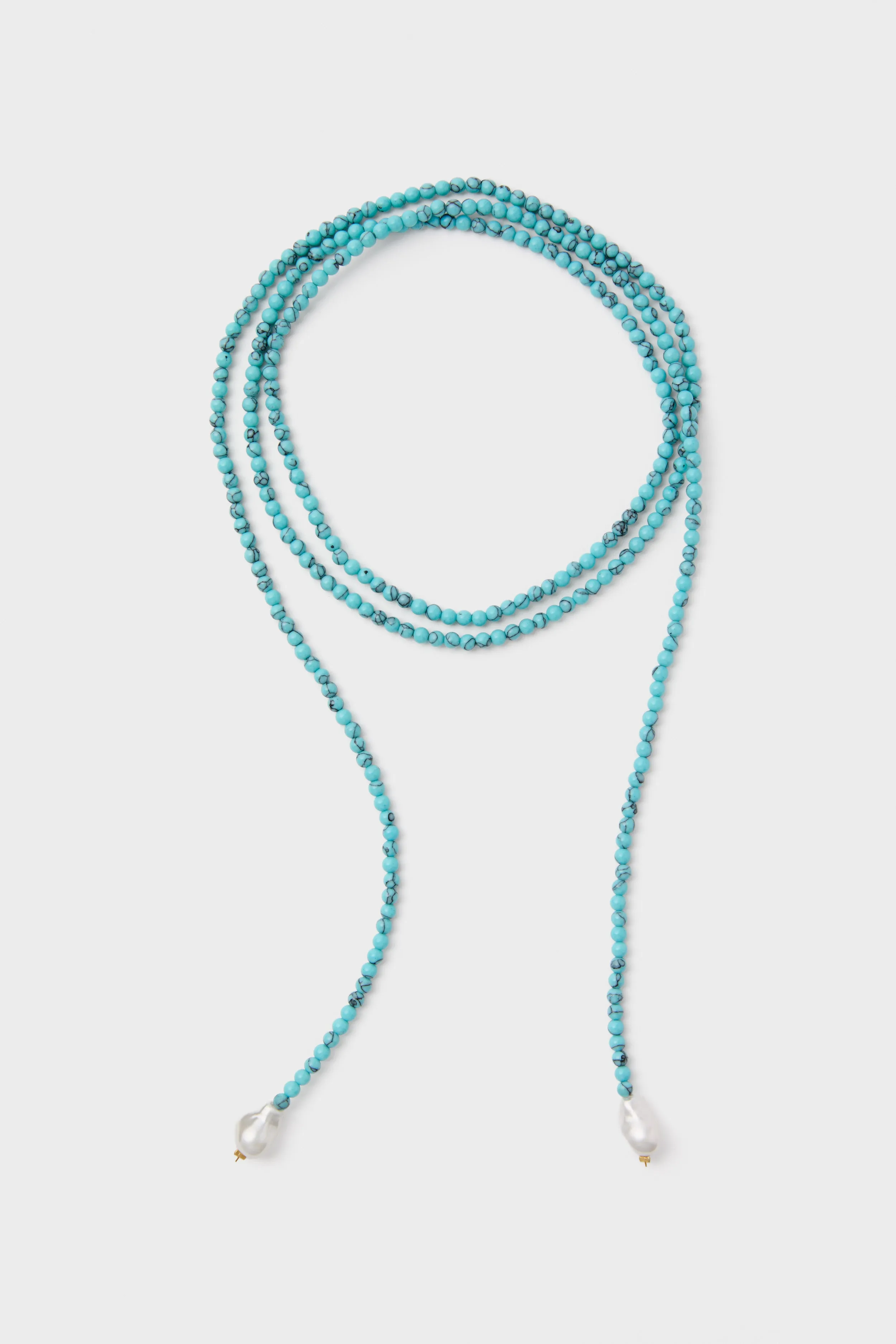 Turquoise Beaded Bolo sold by Tuckernuck