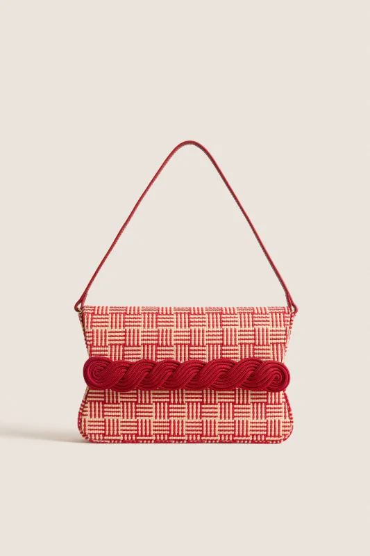Natural and Red Gerrit Straw Clutch sold by Tuckernuck