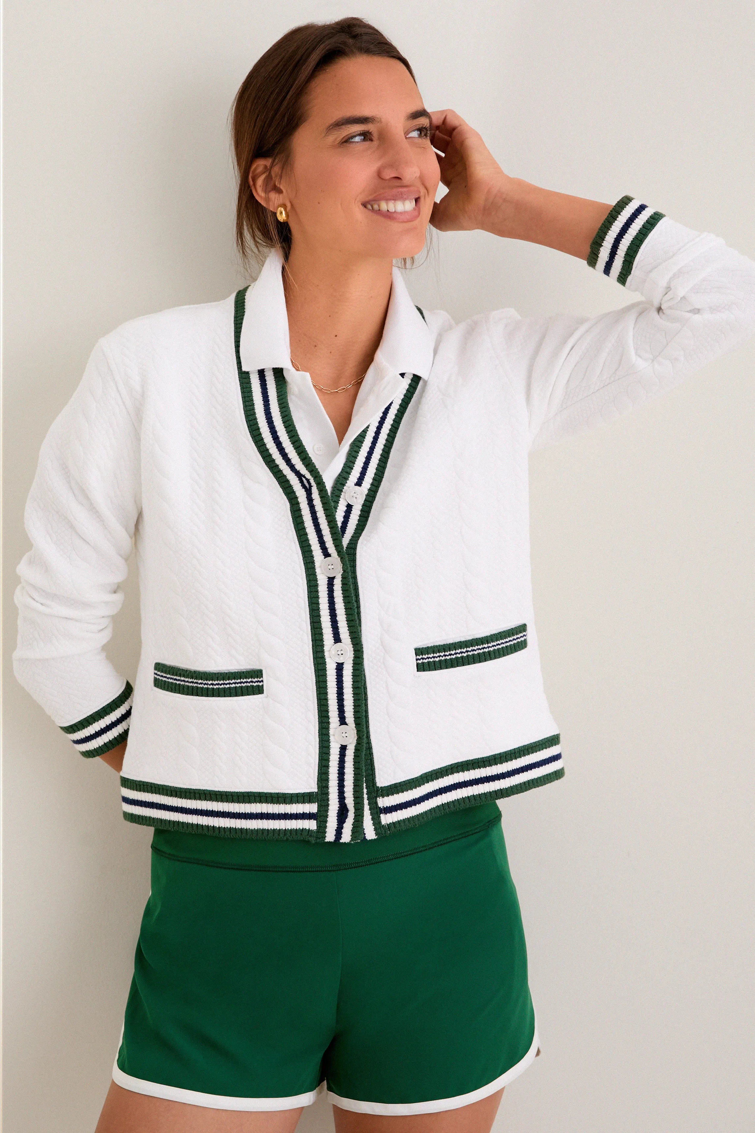 White and Eden Green Cable Charley Cardigan sold by Tuckernuck