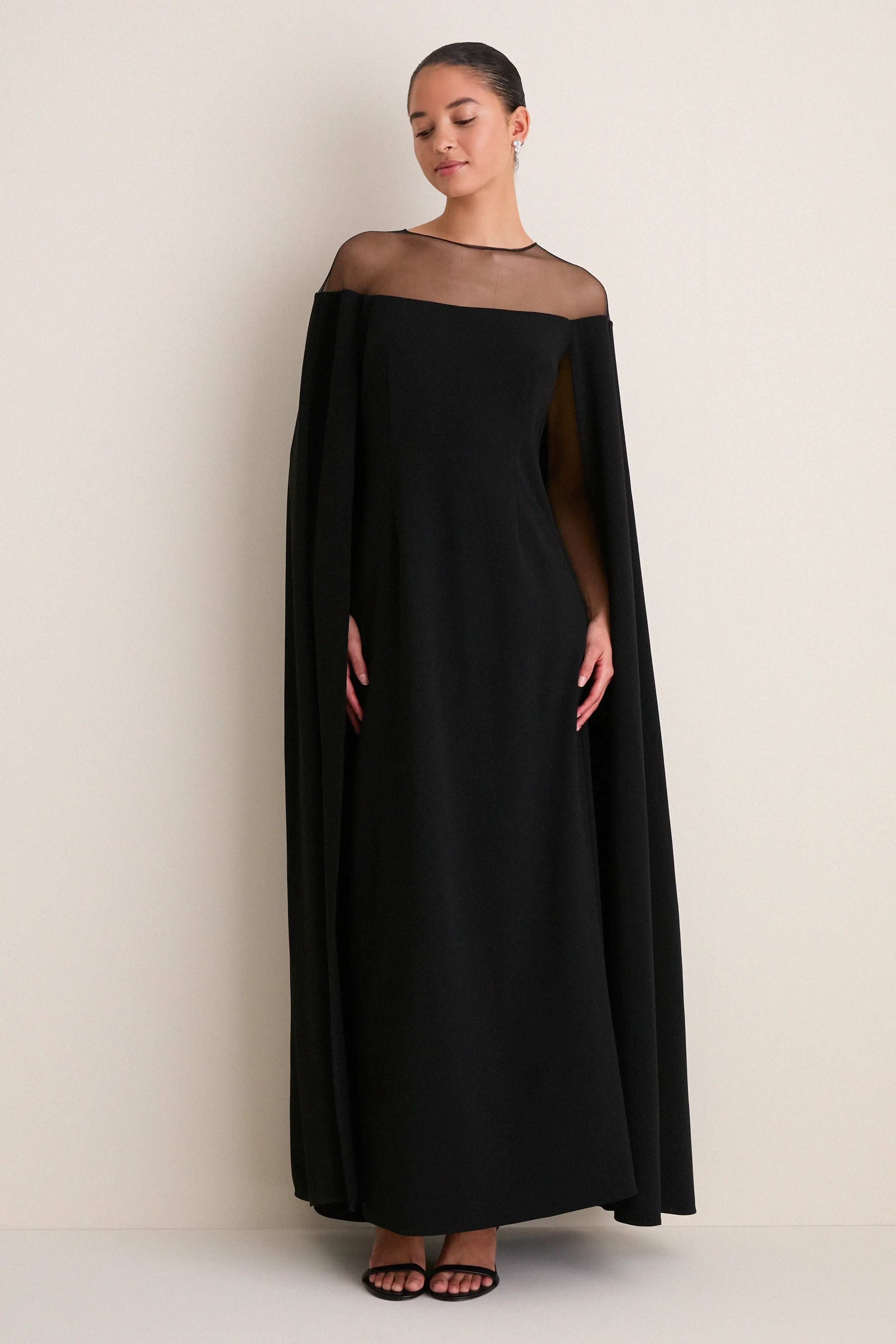 Black Estelle Cape Maxi Dress sold by Tuckernuck