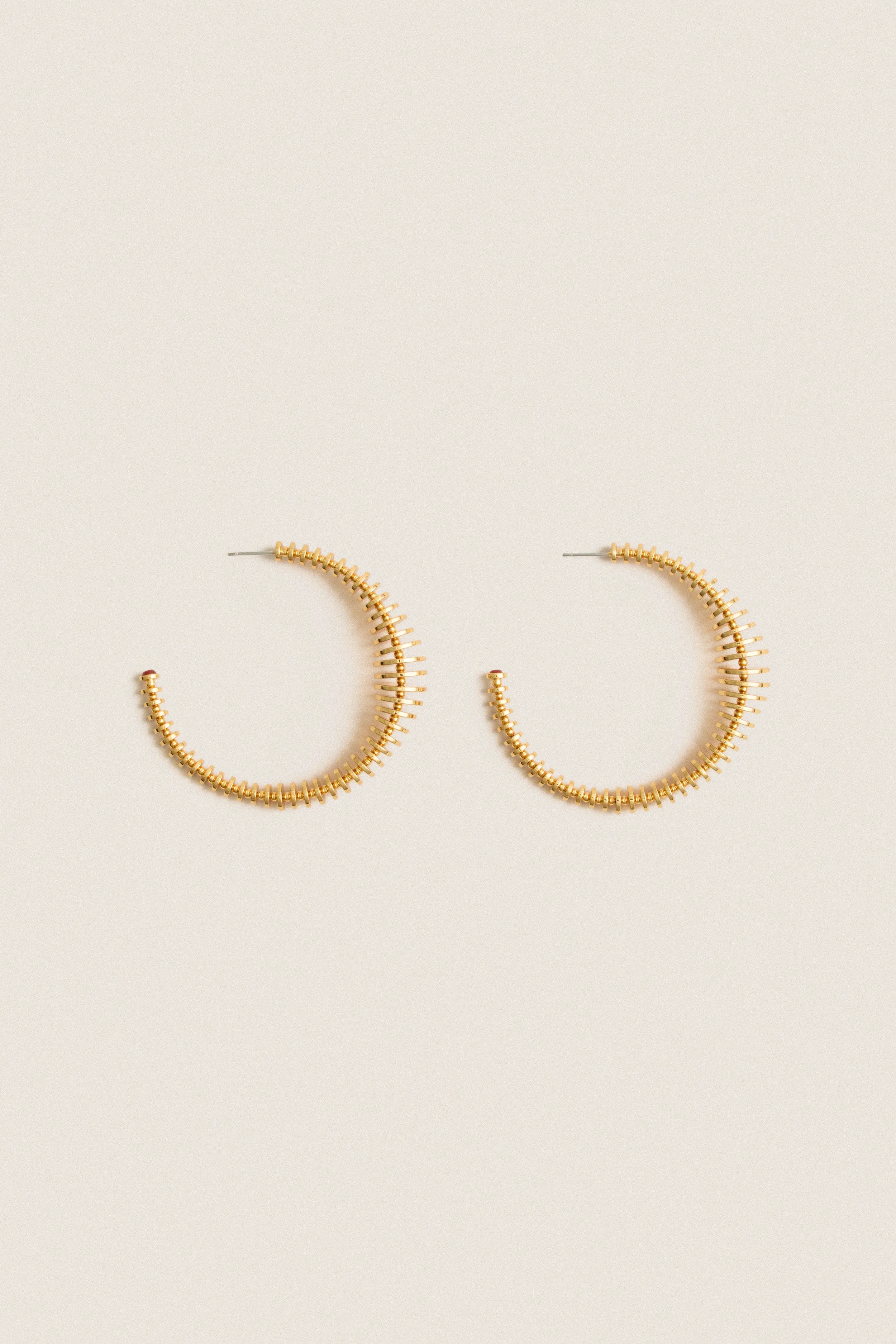 Discus Hoop Earrings sold by Tuckernuck