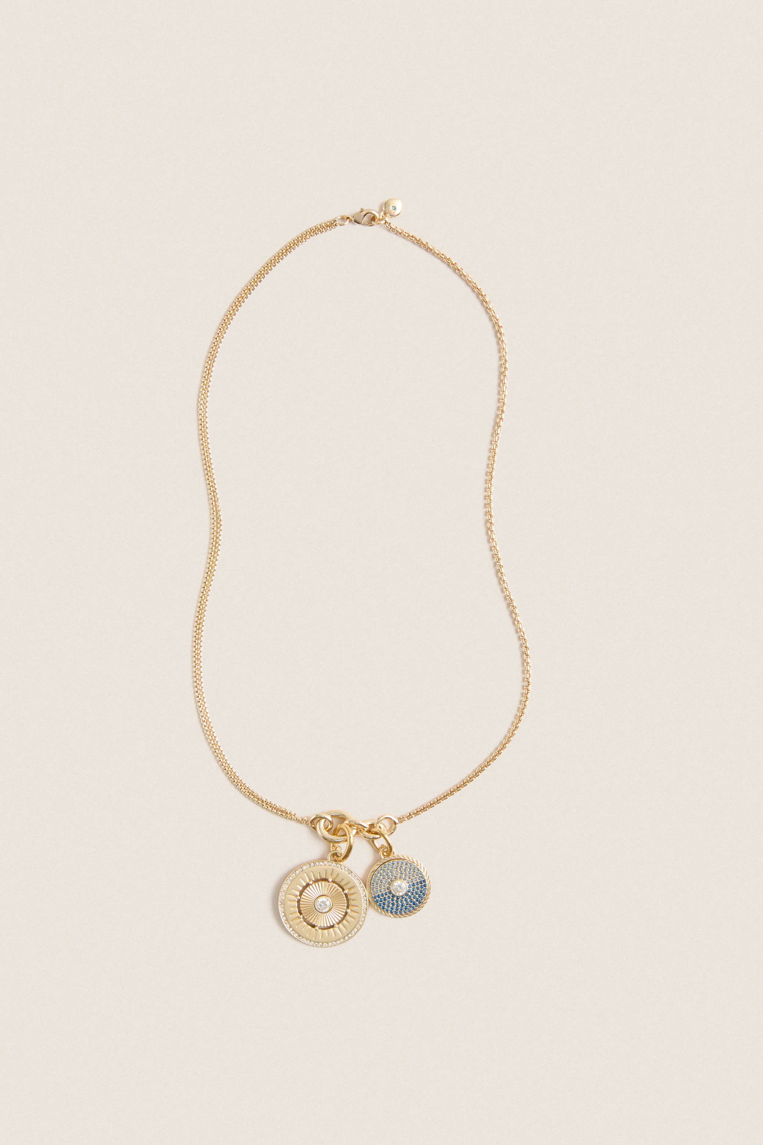 Gold, Clear and Sapphire Multi Strength and Peace Coin Necklace sold by Tuckernuck