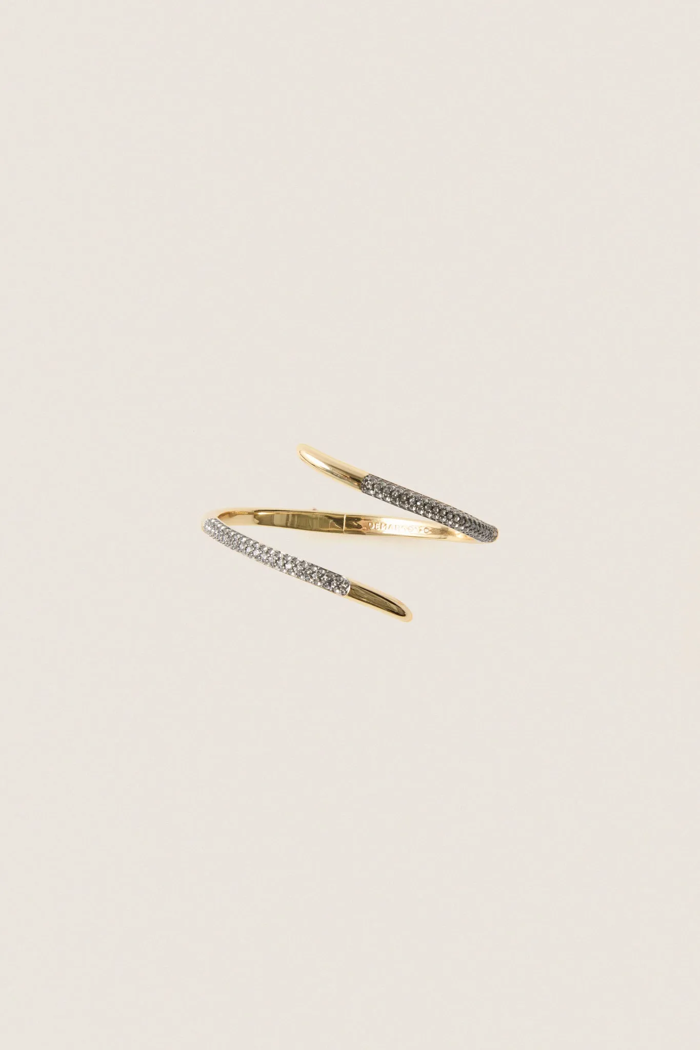 Gold, Gunmetal and Crystal Vesey Cuff sold by Tuckernuck