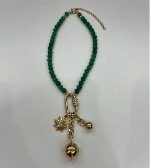 Green Bead Necklace with Gold Charm Trio sold by Tuckernuck