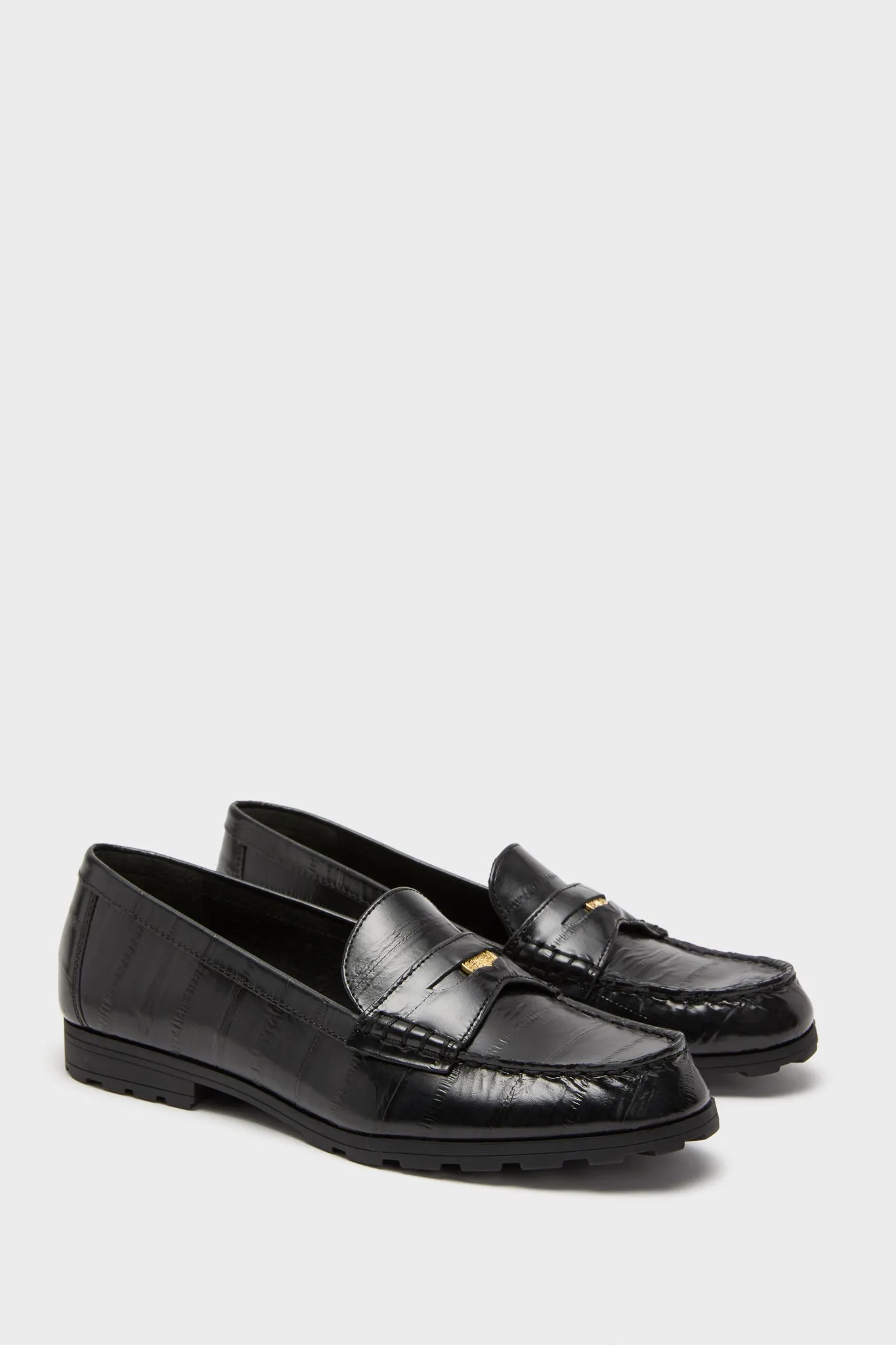 Black Penny Lug Loafers sold by Tuckernuck