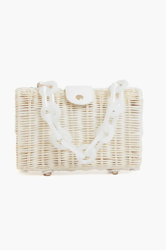 Cream Page Clutch sold by Tuckernuck