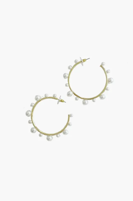 Gold And Pearl Hoop Earrings sold by Tuckernuck