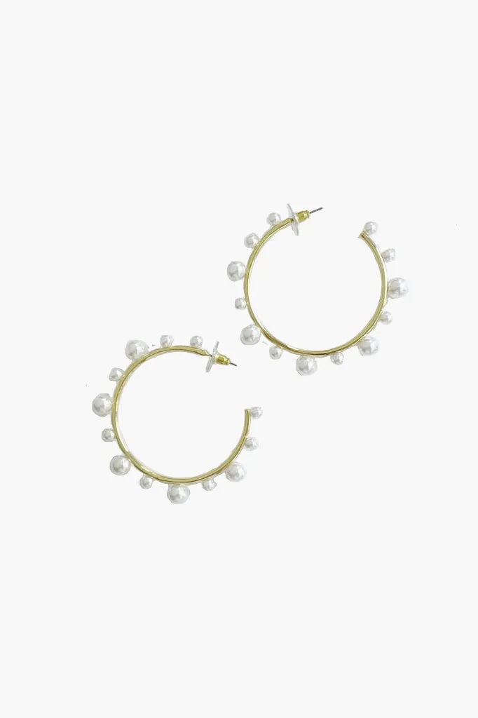 Gold And Pearl Hoop Earrings sold by Tuckernuck
