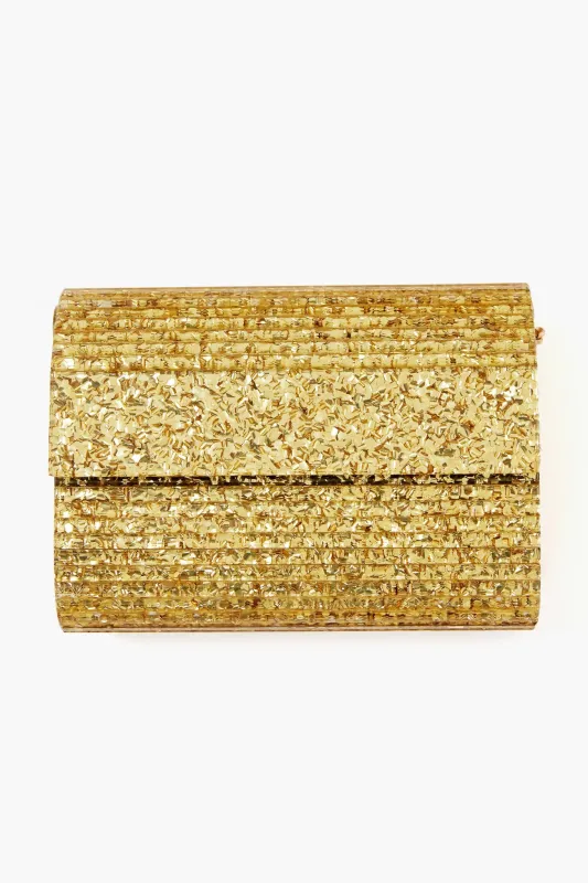 Gold Stacer Acrylic Clutch sold by Tuckernuck