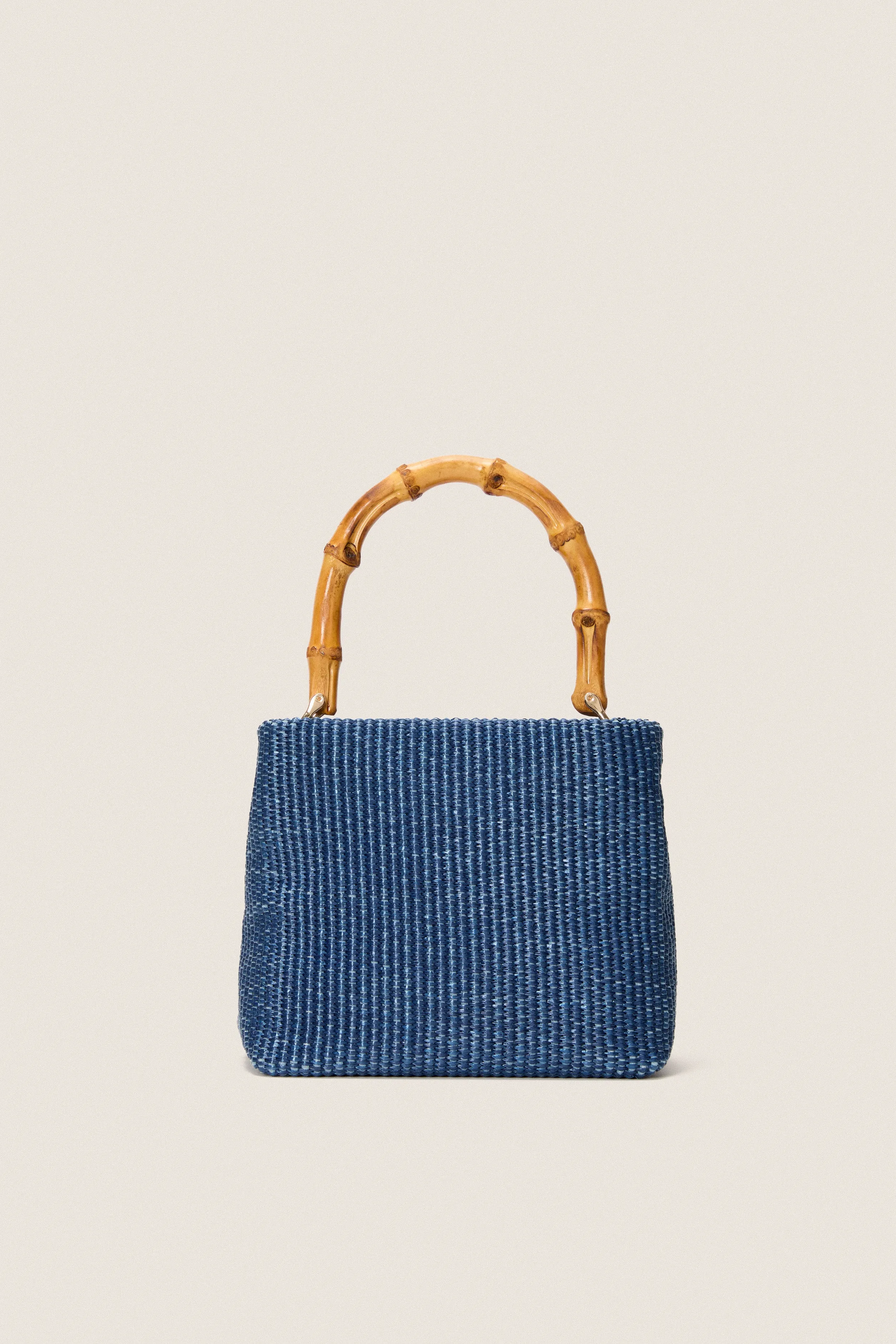 Navy Raffia Audrey Lady bag sold by Tuckernuck
