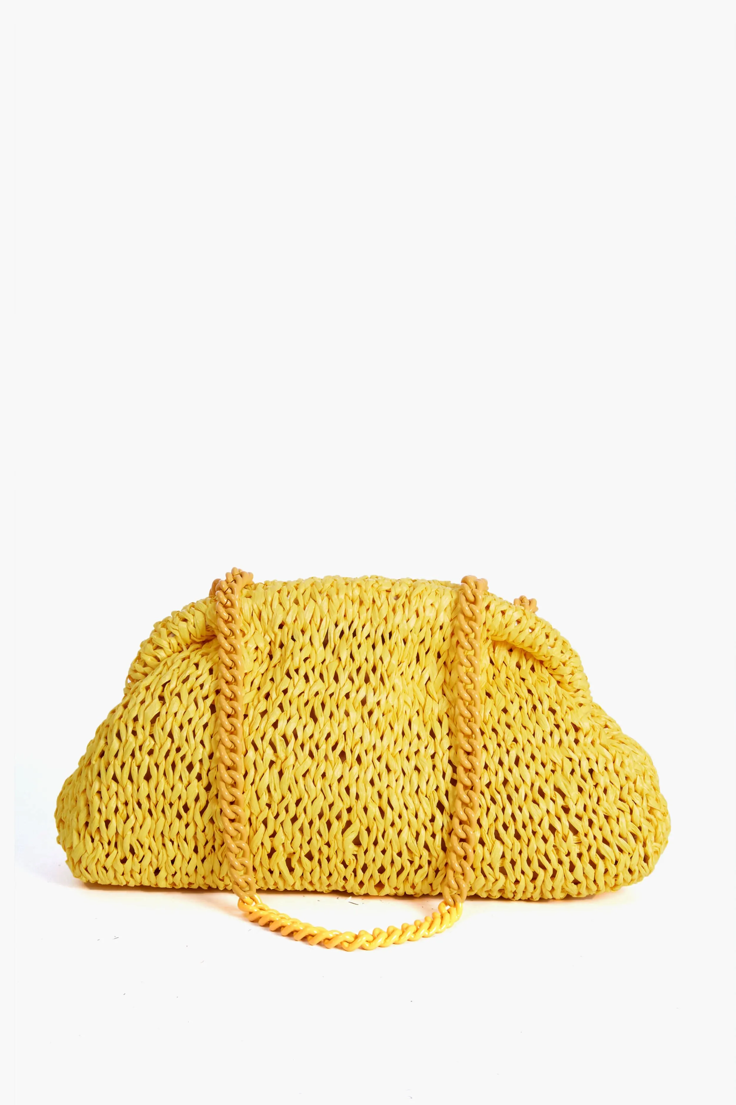 Yellow Raffia Game Clutch sold by Tuckernuck