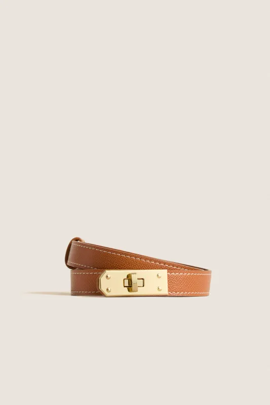 Tan and Gold Blake Belt sold by Tuckernuck