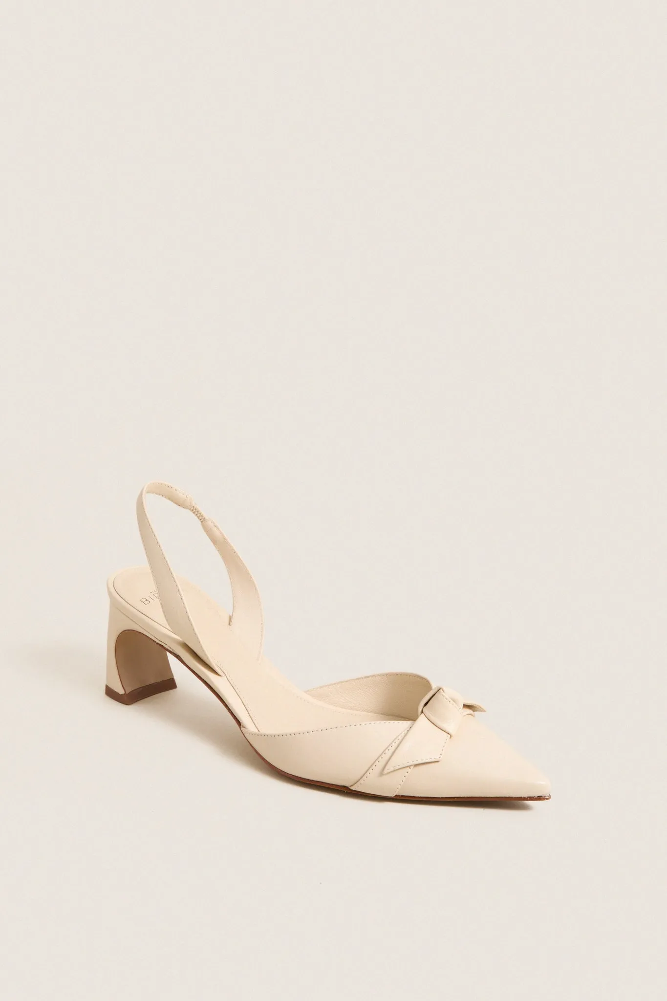 Eggshell Clarita Arch 60 Heels sold by Tuckernuck