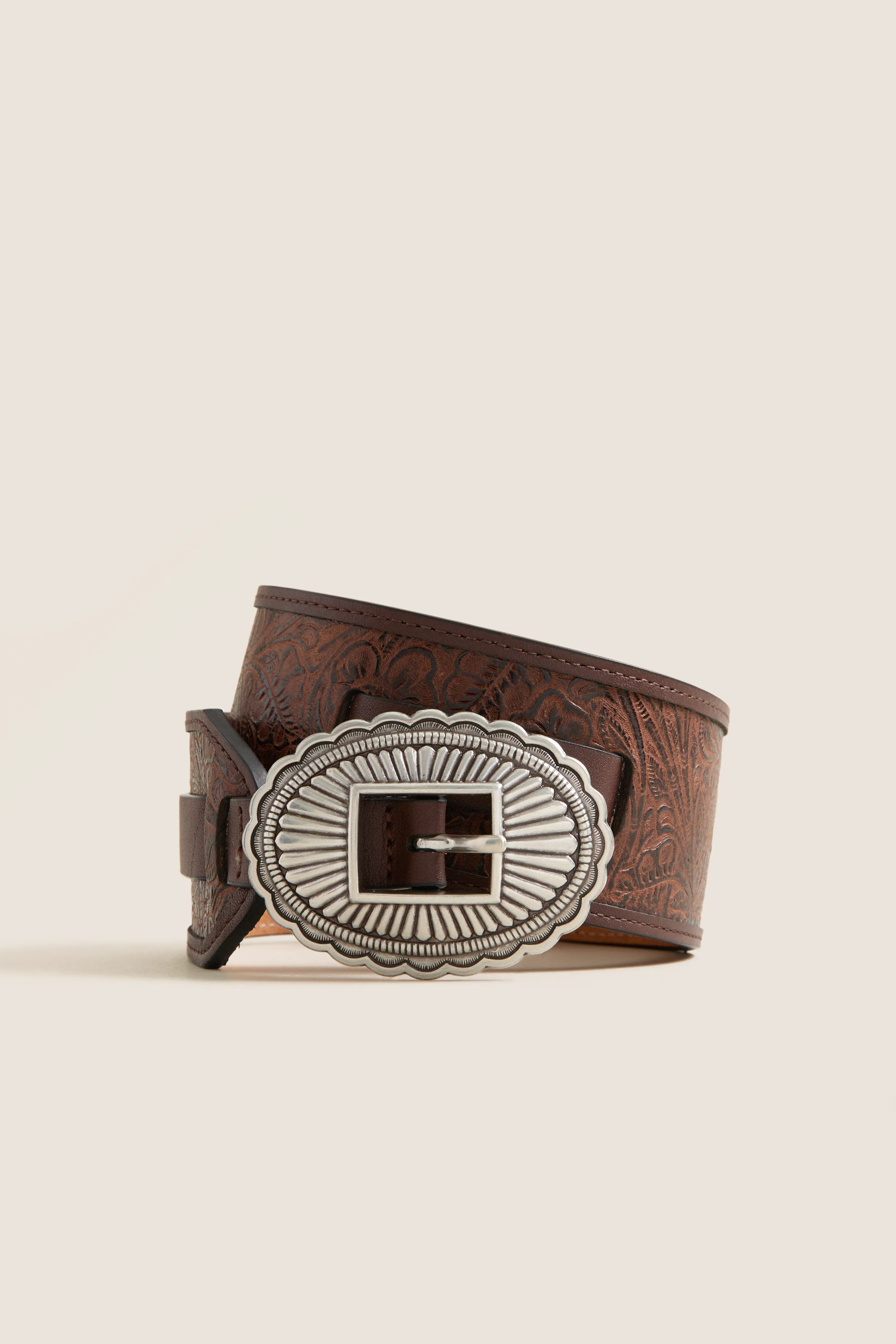THE GREAT. x Stetson Brown and Silver Tooled Waist Belt sold by Tuckernuck